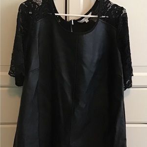 Black faux leather tunic with lace sleeves.